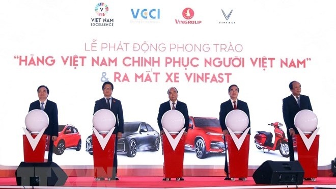 Le Premier ministre Nguyên Xuân Phuc au ancement du mouvement « Les produits vietnamiens conquièrent les Vietnamiens ». Photo : VNA