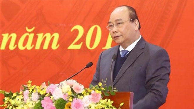 Le Premier ministre Nguyên Xuân Phuc lors de la conférence sur la sensibilisation auprès des masses, le 10 janvier à Hanoï. Photo : VNA