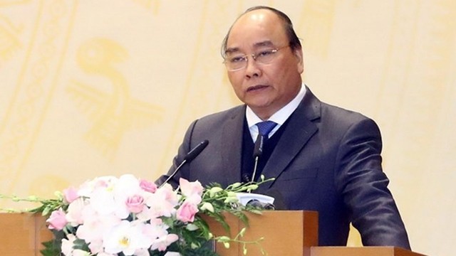 Le PM Nguyên Xuân Phuc prend la parole lors de la conférence du bureau du gouvernement, pour faire le bilan de son travail en 2018 et déployer ses tâches pour 2019, le 10 janvier à Hanoi. Photo : VGP.