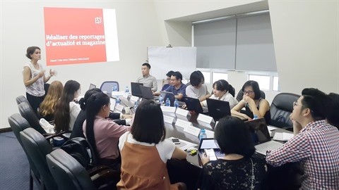 L'atelier de formation au reportage est organisé du 24 au 29 juin dans les locaux de l'Agence Vietnamienne d'Information à Hanoï. Photo : Trân Truong/CVN.