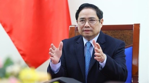 Le Premier ministre vietnamien, Pham Minh Chinh, s’est entretenu au téléphone, jeudi 13 janvier, avec son homologue chinois Li Keqiang. Photo : VNA.